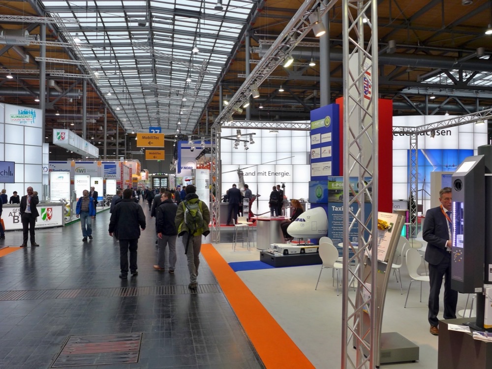 Visitors walking down the central aisle of Hall 27 at Hannover Messe 2016
