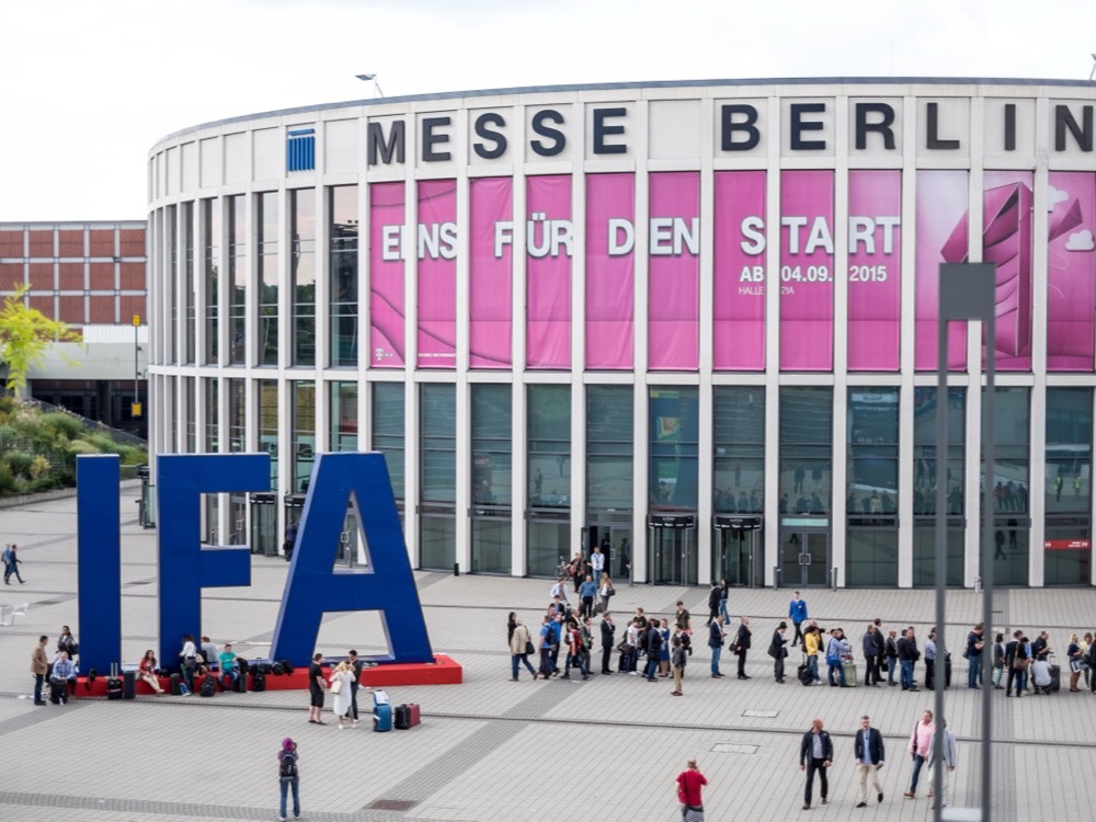 Large blue IFA letters in front of the round Messe Berlin entrance building