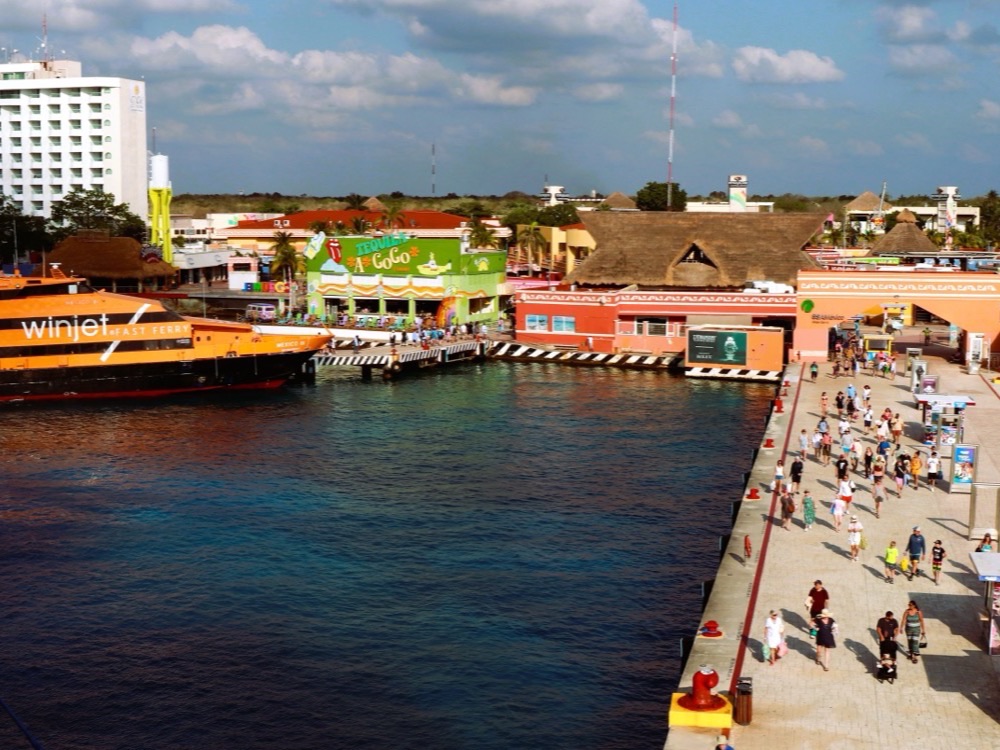 The international cruise pier at Cozumel, Mexico, with passengers walking ashore