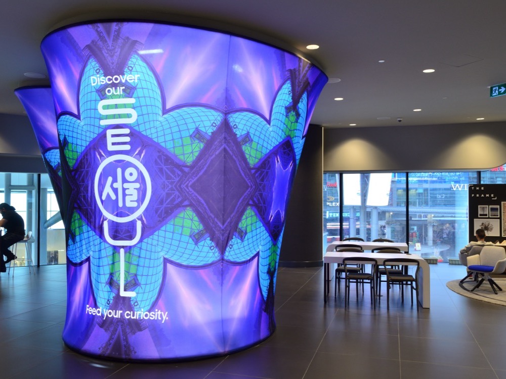 A Samsung Experience Store seen from the mall concourse