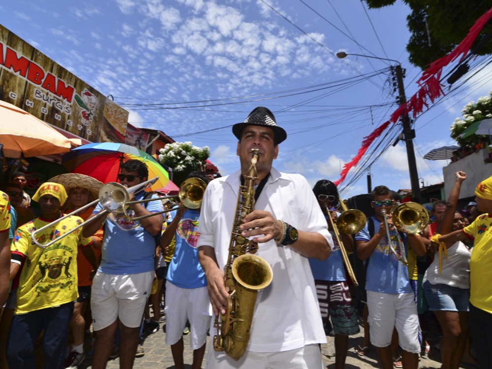 A brass band playing frevo in the street during the Olinda carnival
