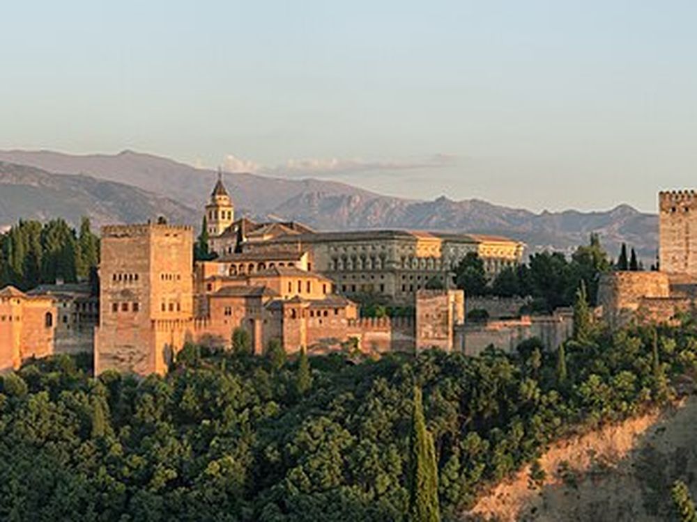 The Alhambra at dusk seen from the Mirador de San Nicolás, Granada