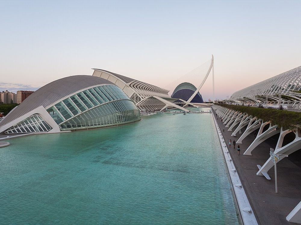 The white buildings of the City of Arts and Sciences in Valencia reflected in their pools